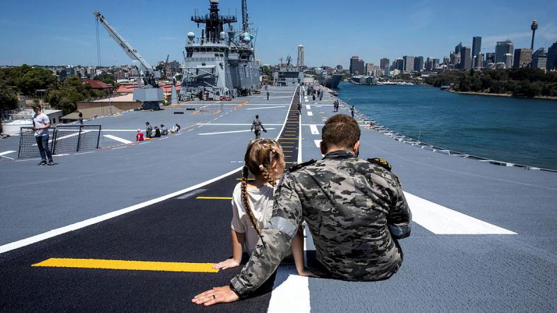 Family and friends of HMAS Adelaide ship's company sail through Sydney Harbour, the start of a Families Cruise to Eden, NSW.