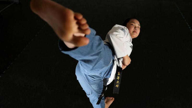 RAAF legal officer Flight Lieutenant Leah Park practises Taekwondo in the ADFA Gym in Canberra. 
