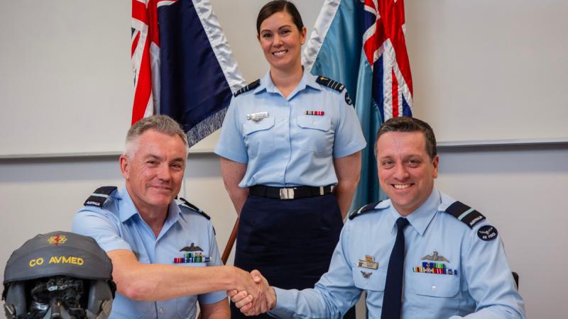 (L-R) Commander Air Force Training Group Air Commodore David Strong, Commanding Officer Institute of Aviation Medicine Wing Commander Riannon Quemard and Commander Air Warfare Centre Air Commodore Adrian Maso during the transfer of command ceremony at RAAF Base Edinburgh, South Australia.