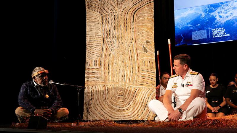 Artist and Madarrpa clan Elder, Djambawa Marawili, gifts his painting Spirit of Sea Rights to Chief of Navy Vice Admiral Mark Hammond at the Indo-Pacific Sea Power Conference in Sydney. Photo: Leading Seaman Susan Mossop