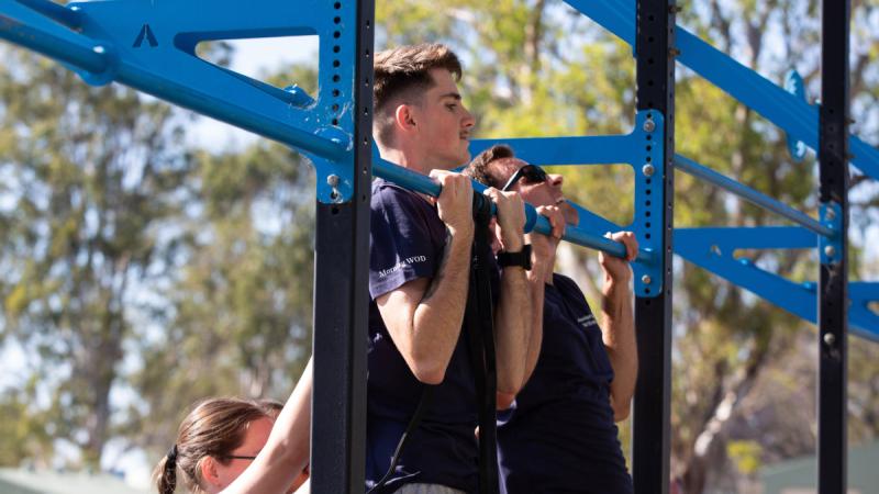 Personnel from 6 Squadron take part in a Remembrance Day physical training exercise at RAAF Base Amberley.