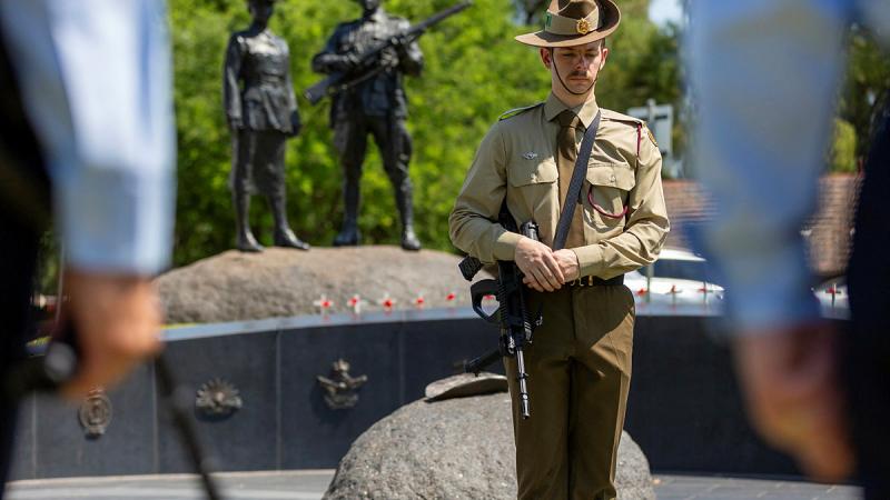 An soldier rests on arms during a service marking the 10th anniversary of the dedication of the Aboriginal and Torres Strait Islander War Memorial in Adelaide.