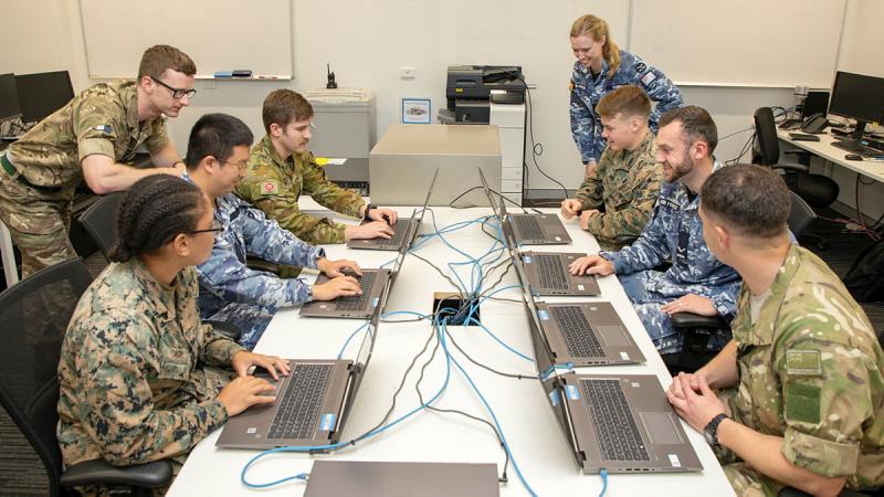 Cyber Security Teams from Australia, the United States, the United Kingdom and New Zealand work together at Robertson Barracks in the Northern Territory during Operation INCAA. 