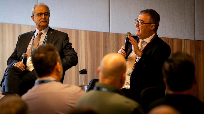 Deputy Secretary Capability Acquisition and Sustainment, Chris Deeble, and Deputy Secretary Naval Shipbuilding and Sustainment Group, Jim McDowell, hold a panel discussion at the Indo-Pacific Sea Power Conference, Sydney, 2023. 