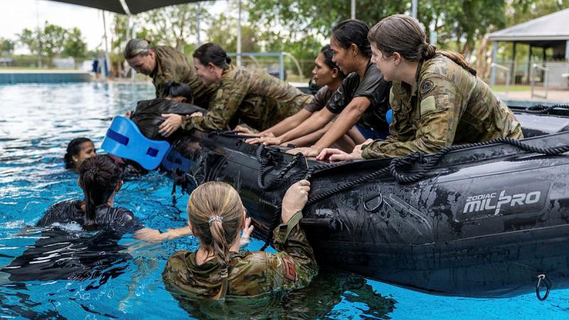 Members of The Timor-Leste Defence Force and 1st Combat Engineer Regiment conduct basic littoral and swim testing with a Zodiac watercraft during the Gender Development program at Robertson Barracks, NT.
