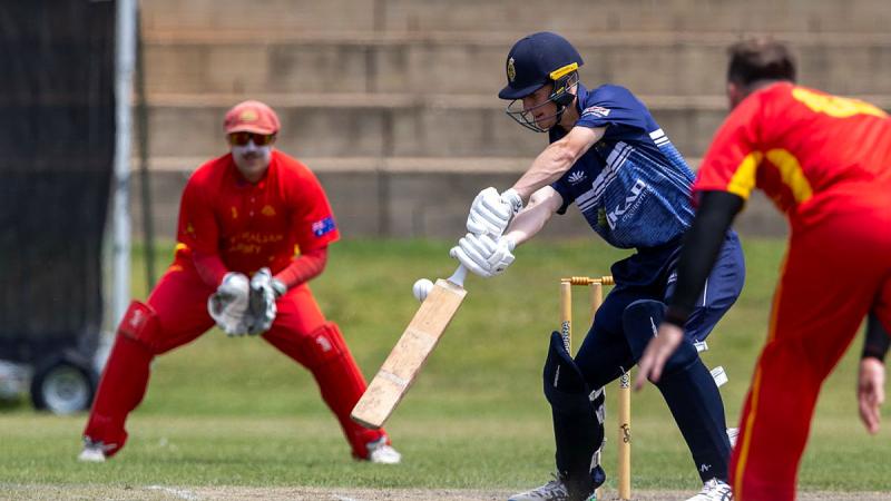  Navy Able Seaman Ben Schofield hits the ball during a one-day match against Army at the ADF National Inter-Service Cricket Championships in Canberra. 