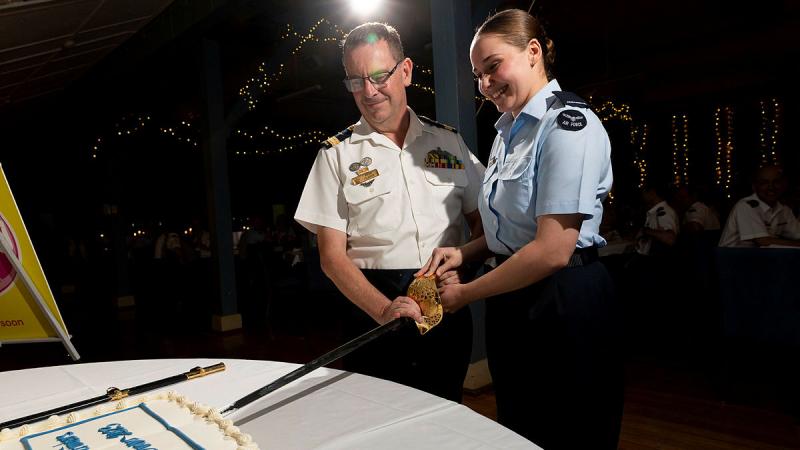 Commander Air Mobility Group, Air Commodore Bradley Clarke and Aircraftwoman Jorja Winterford cut the cake during the annual Air Mobility Group Pathfinder Awards Dinner at RAAF Base Richmond. Photos: Leading Aircraftman Chris Tsakisiris