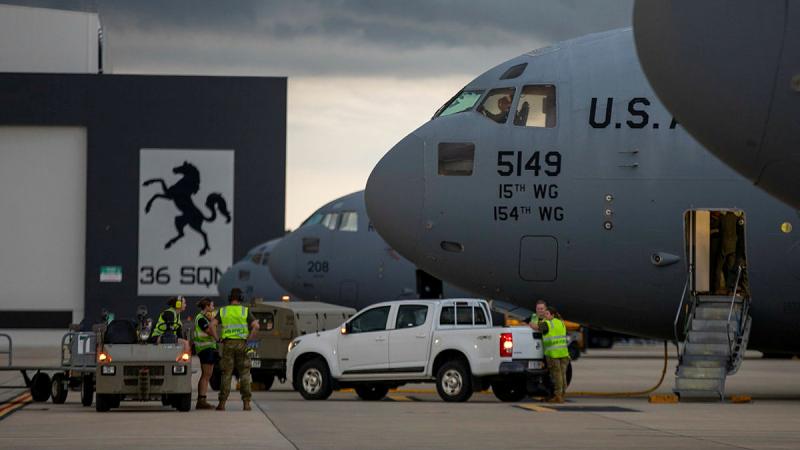 C-17A Globemaster III aircraft of the RAAF 36 Squadron and United States Air Force 15th Wing on the 36 Squadron flight line at RAAF Base Amberley at the beginning of Exercise Global Dexterity. Photo: Corporal Kieren Whiteley