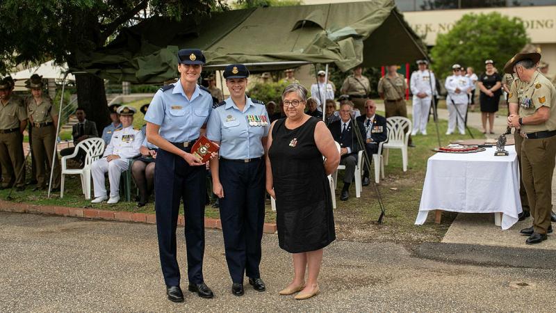 RAAF Aircraftwoman Eloise Hiller-Stanbrook (left) receiving the Sergeant Wendy Jones award from Flight Lieutenant Brook Steege (middle) and Alison Meade at the Army School of Health graduation at Latchford Barracks.