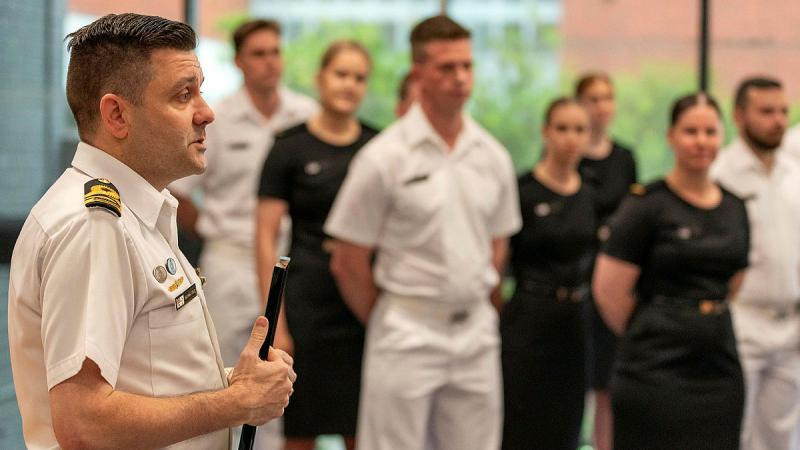 Officer Commanding, Defence Force School of Signals Maritime Communication and Information Systems Wing, Lieutenant Commander Nathan Cole, makes a speech at HMAS Cerberus, Victoria. 
