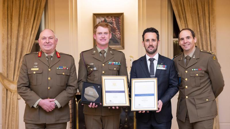 Recipient of the 2023 Prince of Wales Award, Major Ryan Barwick, centre left, with his civilian employer, Jeff Batten of UBH group, and Major General Douglas Laidlaw at the ACT Prince of Wales Awards Ceremony at Government House.