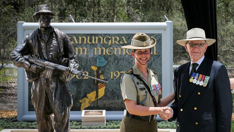 Lieutenant Colonel Wendy Say with, veteran and founder of the Kokoda Youth Foundation, Doug Henderson in front of the new Canungra Vietnam Memorial at Kokoda Barracks in Queensland. Photos: Private Andrew Shaw