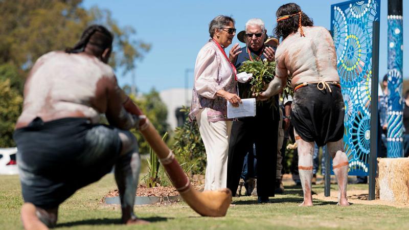 Worimi Elders Aunty Lorraine Lilley and Uncle Neville Lilley participate in a smoking ceremony at the opening of a Ngarralbaa (yarning circle), RAAF Base Williamtown. 