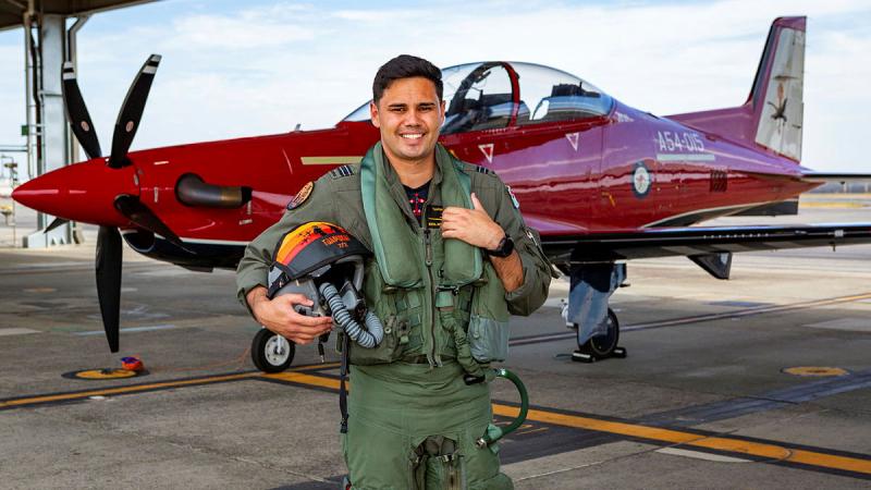 Flight Lieutenant Tjapukai "Tjap" Shaw in front of a 2 Flying Training School Pilatus PC-21.