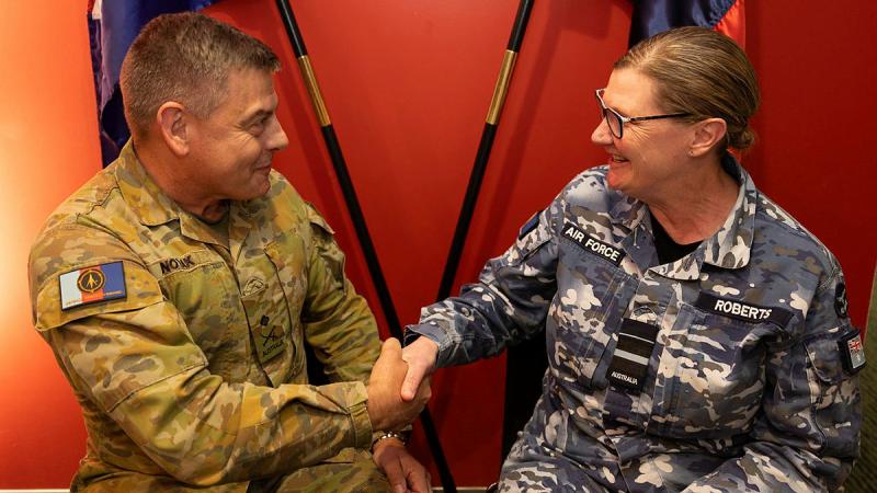 Outgoing Space Commander Air Vice-Marshal Cath Roberts congratulates Major General Greg Novak on his appointment at Space Command Headquarters in Canberra. 