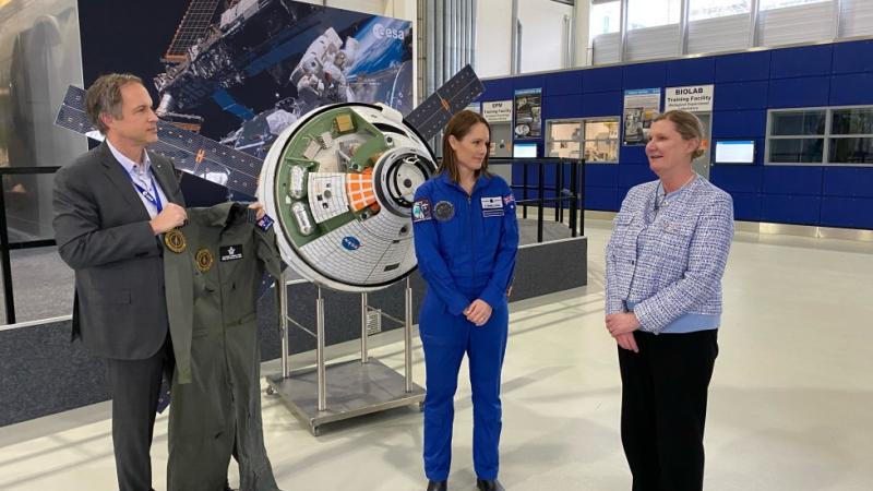 Astronaut candidate, Katherine Bennell-Pegg, receives her Air Force uniform at the European Space Agency in Germany from Air Vice-Marshal Catherine Roberts and European Space Agency Director Daniel Neuenschwande following her appointment as Honorary Group Captain in RAAF.