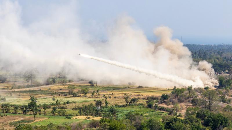 A United States Army M142 high mobility artillery rocket system (HIMARS) fires in Puslatpur, Indonesia, during Exercise Super Garuda Shield 2023.