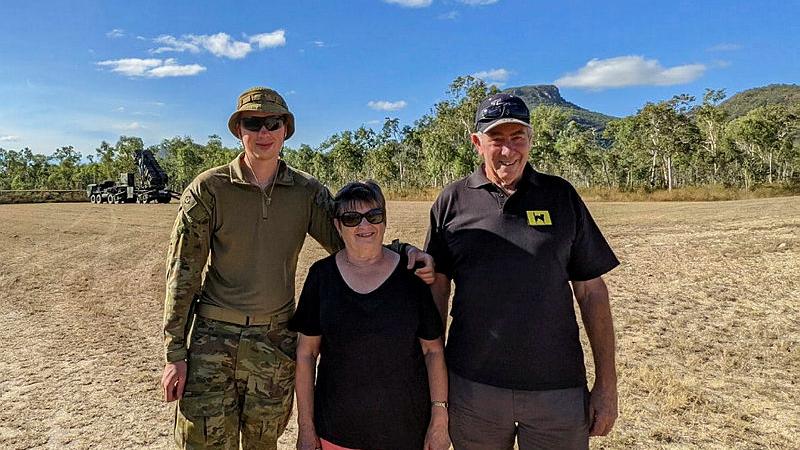 Australian Army soldier Bombardier Jordan Whicker with grandparents, Sue Wilkinson and Dean Wilkinson, in Townsville during a tour of a Patriot Missile launcher in 2021.