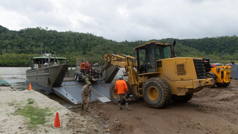 An Australian Army Landing Craft Mechanised Mk8 (LCM8) from 10th Force Support Battalion delivers plant equipment to the community of Ayton, Queensland as part of the ADF support to the region following the devastation of Ex Tropical Cyclone Jasper.