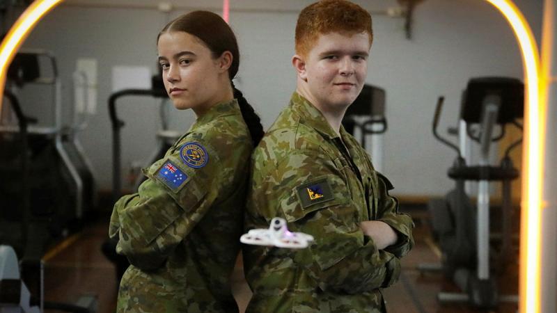 Members of the Australian Army Cadets prepare to race tiny drones during the Army Cadet Drone Racing Camp at Gallipoli Barracks, Enoggera, Queensland. 