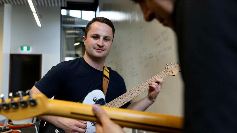 ADF ARRTS program participant, Corporal Lewis James, performs during a music and rhythm class