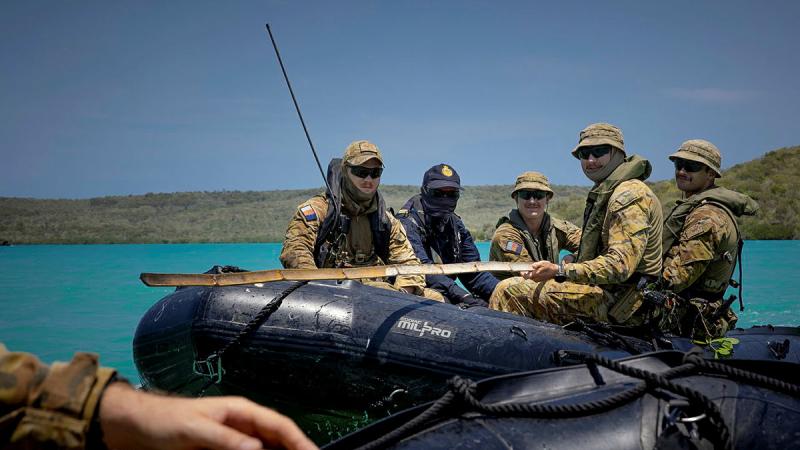 Soldiers from the 5th Battalion, Royal Australian Regiment, survey the mangroves for illegal fishing activities in the Kimberley Marine Park region in North Western Australia, during Operation Resolute.