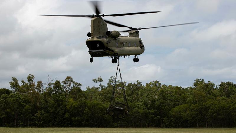 An Australian Army CH-47F Chinook Helicopter delivers plant equipment and additional personnel to the community of Bloomfield, Queensland as part of the ADF support to the region following the devastation of Ex Tropical Cyclone Jasper. 