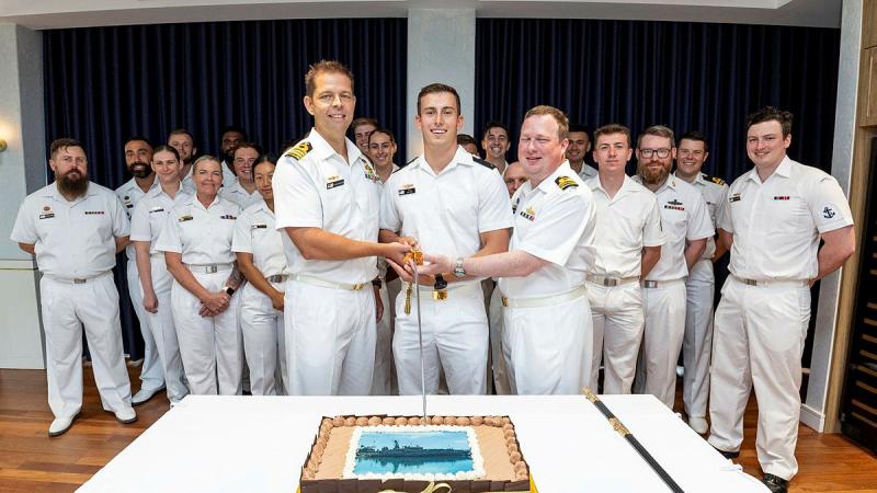 From left, Commander Mine Warfare, Clearance Diving, Hydrographic, Meteorological, Oceanographic and Patrol Force Captain Richard Brickacek, Midshipman Rhys Willaims, and Commanding Officer of ADV Cape Pillar, Lieutenant Commander Liam McMahon cut a Homeporting cake at Larrakeyah Officers Mess, Darwin. 