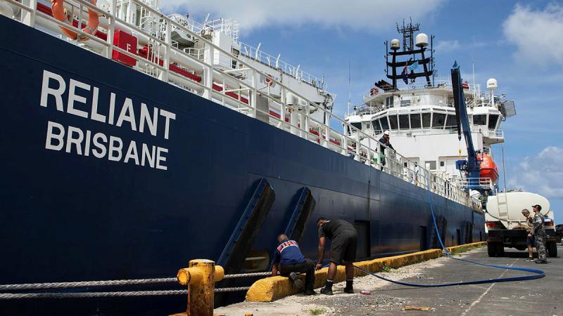 Australian Defence Vessel Reliant transfers fresh water to a Pohnpei fire department tanker during a port visit to Pohnpei, Federated States of Micronesia. 