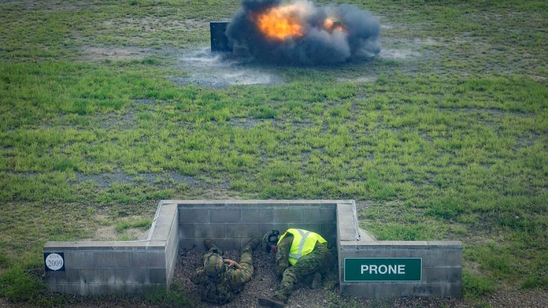 Soldiers conduct moving grenade drills at Townsville Field Training Area, Queensland.