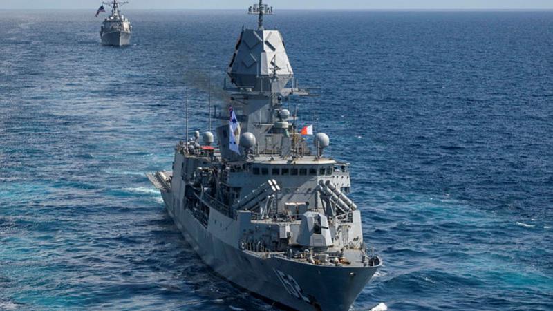 HMAS Warramunga conducts a cooperative activity with the United States and Japan during a regional presence deployment. Photo: Petty Officer Leo Baumgartner