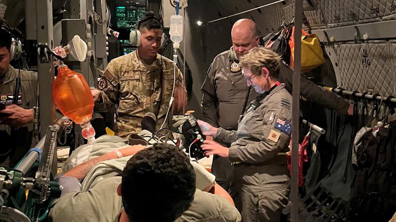 Australian and United States personnel were re-tasked to conduct a real-world aeromedical evacuation during Exercise Cope North 24, flying to Micronesia to extract a patient requiring medical care in Guam. Photo: CPL Deniele Oehm.
