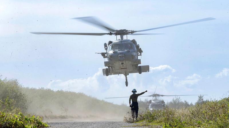 A United States Navy MH-60S Sea Hawk takes flight at Tinian North during Exercise Cope North 24.