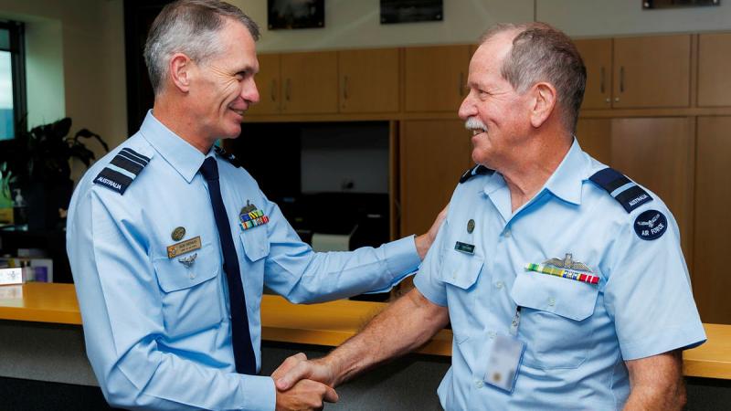 Chief of Air Force, Air Marshal Robert Chipman, greets Air Commodore Tony Jones at Russell Offices, Canberra. 