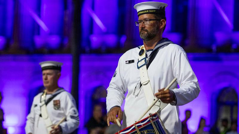 Seaman musician Jason Pannel performs during the ceremonial sunset in Kings Square, Brisbane for the start of Navy Week.
