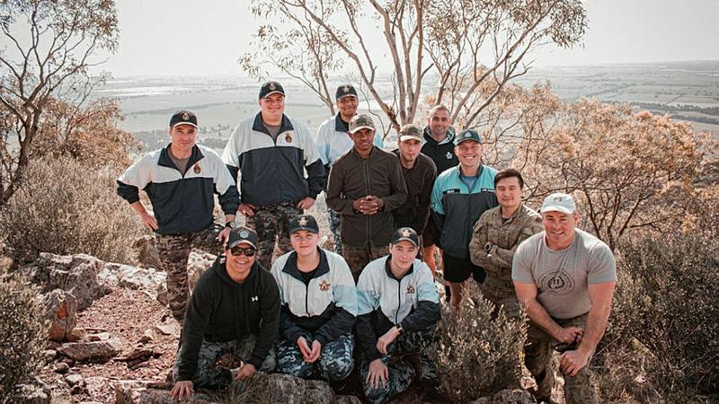Indigenous Pre-Recruit Program instructor, Leading Seaman Kellie Curry (front row, first on left) with participants of a recent iteration of the Indigenous Pre-Recruitment program.