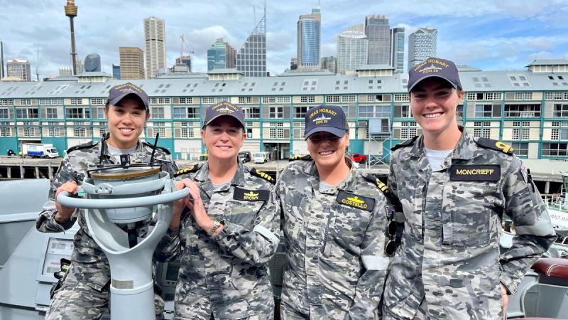 Able Seaman Boatswain’s Mate Kendall Byrnes, left, Commander Tina Brown, Lieutenant Tori Costello and Sub-Lieutenant Cameron Moncrieff onboard HMAS Hobart.