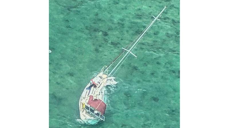 A vessel in distress captured by members of No. 35 Squadron aboard a C-27J Spartan aircraft during a search and rescue mission over the Coral Sea.