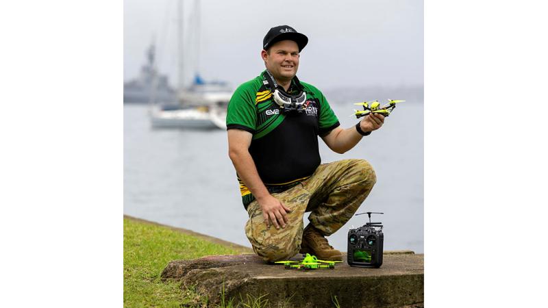 Army Drone Racing Team captain Sapper Alex Brown prepares his equipment for a drone racing tournament at Airshows Downunder Shellharbour. 