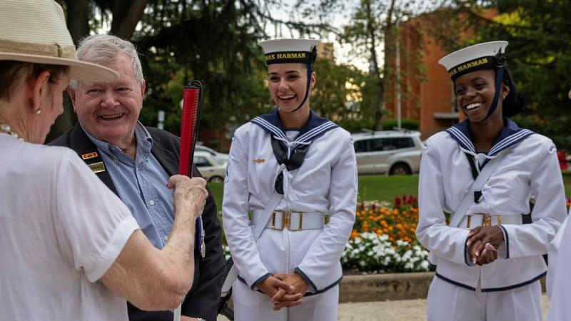   Able Seaman Georgia Bonnett, second from right, and Seaman Vimbayi Hakutangwi, right, talk with veterans in Bathurst, during HMAS Harman's Navy Week tour of the Central West. Photos: Corporal Jacob Joseph
