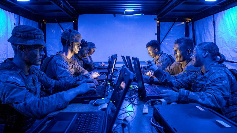Soldiers and officers of Headquarters 3rd Brigade and 3rd Combat Signal Regiment operating a command post during Exercise Brolga Walk at Townsville Field Training Area, Queensland.