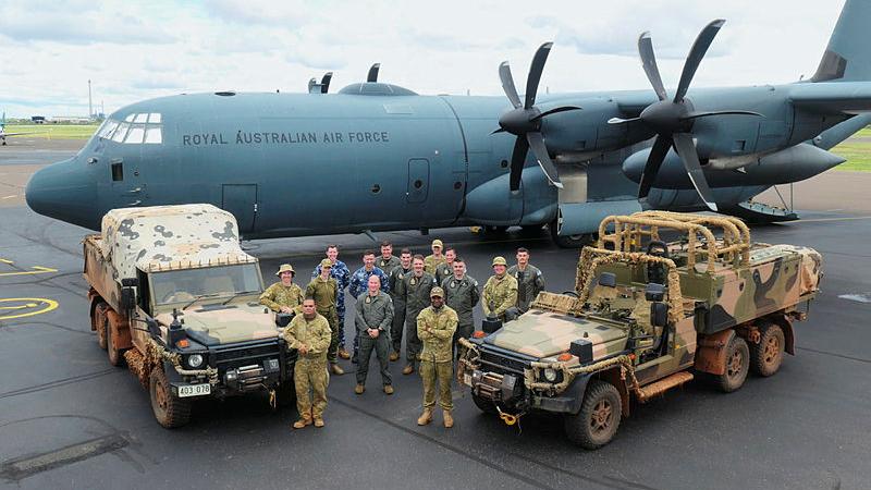 RAAF personnel from 37 Squadron and Australian Army soldiers from 51st Battalion, Far North Queensland Regiment, during an engagement in Mount Isa, Queensland. 