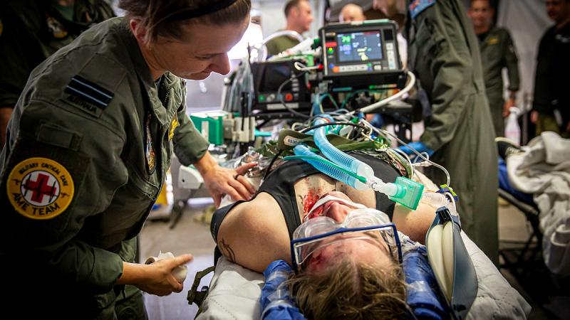 A Royal Australian Air Force Military Critical Care Aeromedical Evacuation team participate in a simulated evacuation scenario in the Australian Army Role 2E health facility during Exercise Viper Walk 2024. Photo: Corporal Melina Young