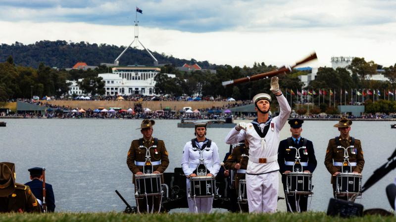 Royal Australian Navy sailor Able Seaman Dean Hall, Australia’s Federation Guard, performs precision drill movements during a display at Canberra Skyfire 2024 at Lake Burley Griffin, Canberra.