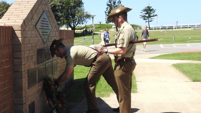 Commanding Officer 5th Combat Service Support Battalion, Lieutenant Colonel Benjamin Shaw, and Regimental Sergeant Major, Warrant Officer Class One Matthew Ryan, lay a wreath as part of the commemoration of the 1954 Stockton Bight Disaster.