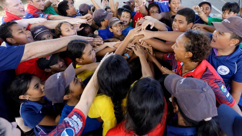 Children at the Vaiala Beach School finish their basketball session on a high during the Australian Defence Force (ADF) sports training program in Samoa.