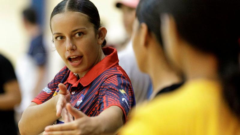 Kajrie Tauiliili from Lotopa, Samoa, coaches her basketball team during a high performance clinic run by the ADF sports training program in Samoa. 