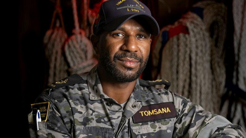 Leading Seaman Edmund Tomsana in the boatswain's store on board HMAS Choules off the coast of Townsville, QLD. 