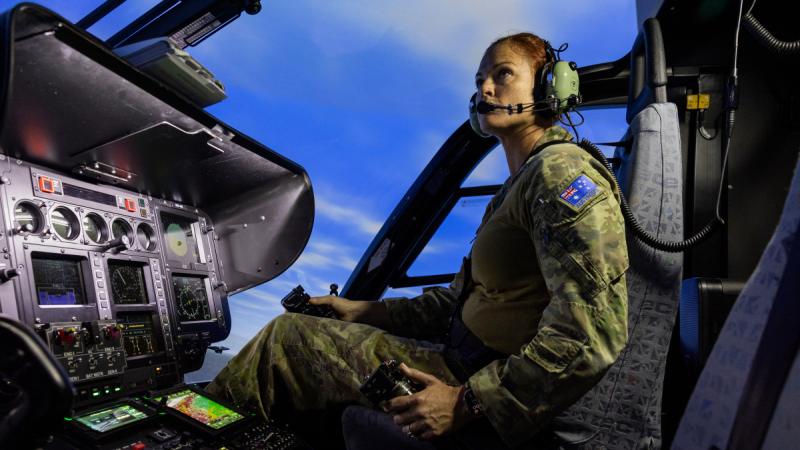 Australian Army helicopter pilot Lieutenant Nicole Ravell from 723 Squadron, conducts a training sortie in a EC-135T2+ helicopter simulator at HMAS Albatross.