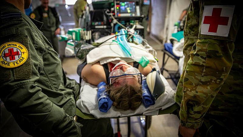RAAF Military Critical Care Aeromedical Evacuation team participate in a simulated evacuation scenario within the Australian Army Role 2E health facility during Exercise Viper Walk 2024.